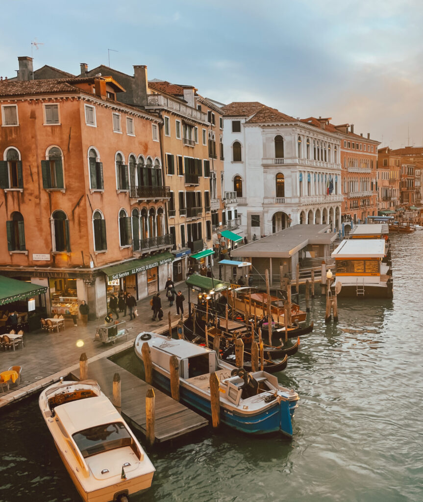 Old buildings along the Grand Canal in Venice at sunset